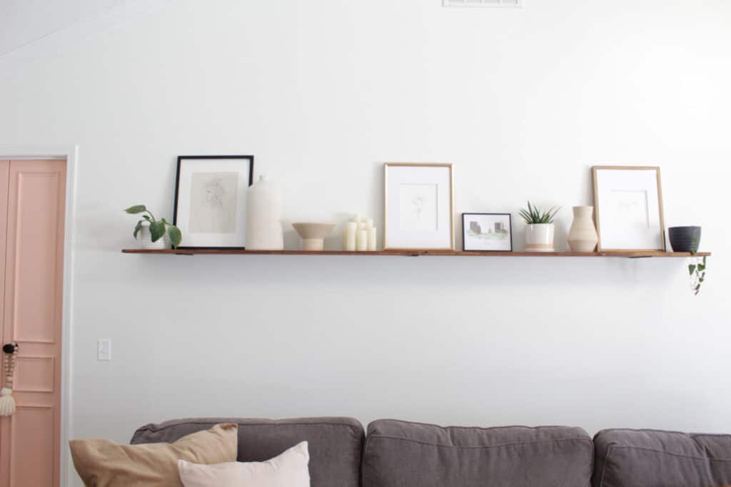 floating shelf decor above couch｜TikTok Search