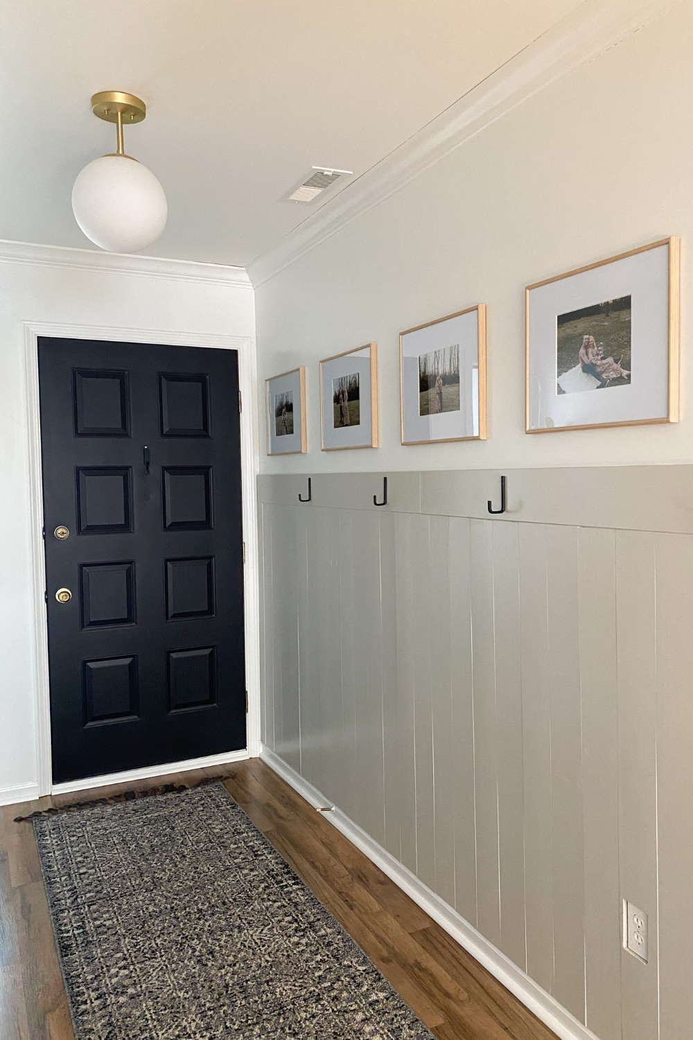 entryway accent wall with hooks